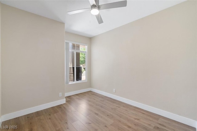 8847 W Katie Ave, Las Vegas, NV 89147 - spare room with light wood finished floors, ceiling fan, and baseboards