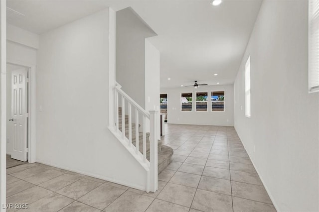 9198 Harbin Ave, Las Vegas, NV 89148 - hallway with light tile patterned flooring, recessed lighting, and stairs