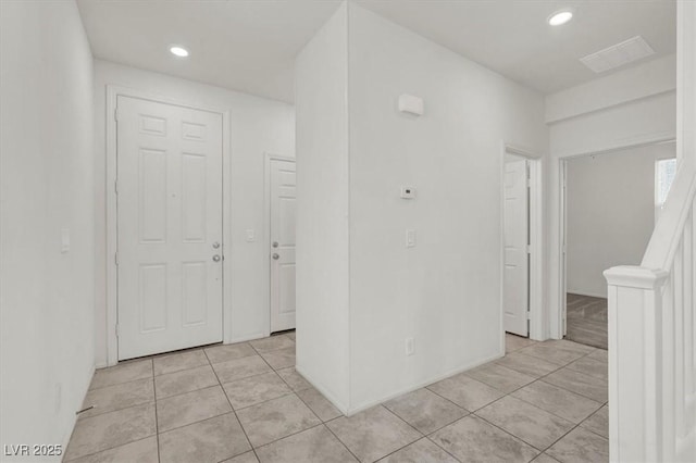 9198 Harbin Ave, Las Vegas, NV 89148 - spare room with light tile patterned floors and recessed lighting