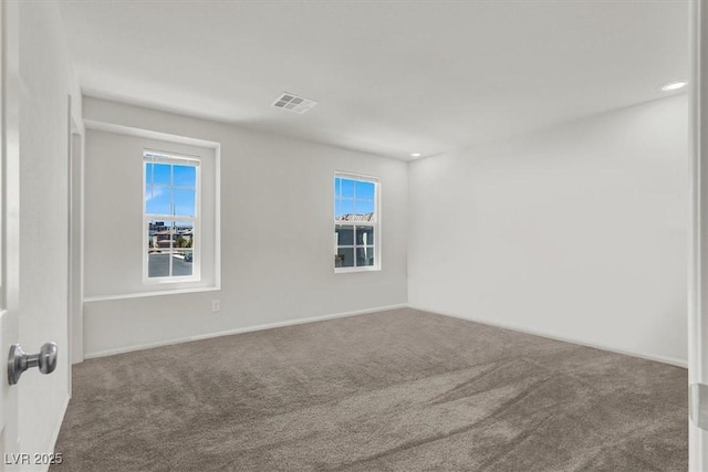 9198 Harbin Ave, Las Vegas, NV 89148 - spare room with carpet floors, baseboards, and recessed lighting