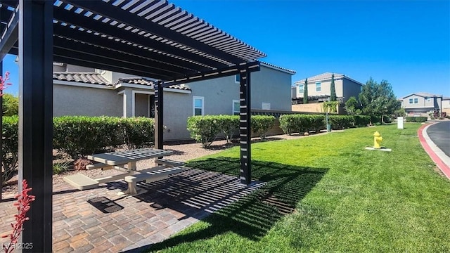 9198 Harbin Ave, Las Vegas, NV 89148 - view of community with a pergola, a yard, a patio, and a residential view