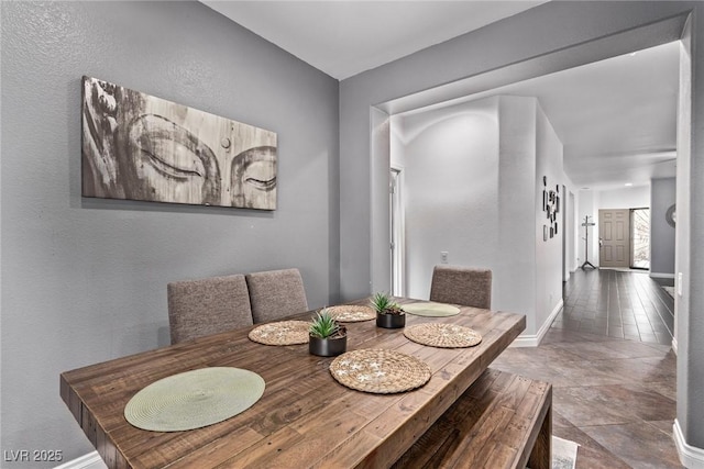 3005 Dotted Wren Ave, North Las Vegas, NV 89084 - dining area featuring baseboards, stone finish floors, and a textured wall