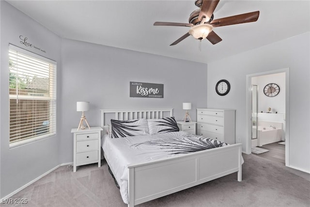 3005 Dotted Wren Ave, North Las Vegas, NV 89084 - carpeted bedroom featuring connected bathroom, baseboards, and ceiling fan