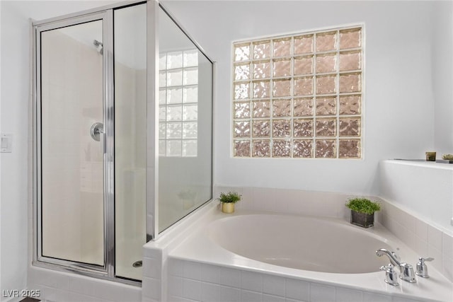 3005 Dotted Wren Ave, North Las Vegas, NV 89084 - bathroom featuring a shower stall and a garden tub