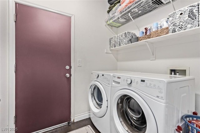 3005 Dotted Wren Ave, North Las Vegas, NV 89084 - laundry room featuring independent washer and dryer, baseboards, and dark wood-style flooring