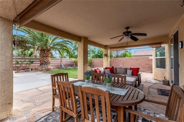 3005 Dotted Wren Ave, North Las Vegas, NV 89084 - fenced backyard featuring an outdoor living space, ceiling fan, a patio area, and outdoor dining area