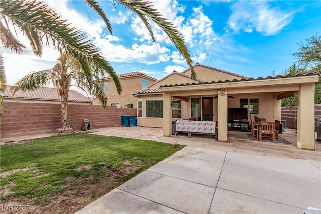 3005 Dotted Wren Ave, North Las Vegas, NV 89084 - rear view of property featuring a patio, stucco siding, and a tiled roof