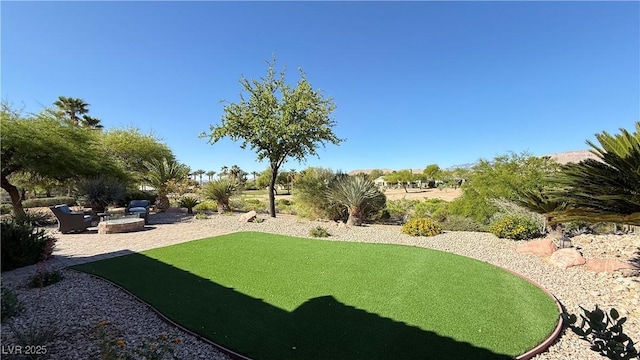 4299 Fiore Bella Blvd, Las Vegas, NV 89135 - view of yard with a fire pit and a patio area