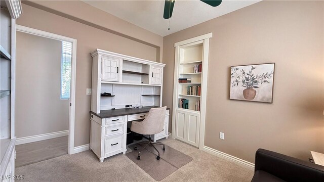 4299 Fiore Bella Blvd, Las Vegas, NV 89135 - home office featuring ceiling fan, light carpet, and baseboards