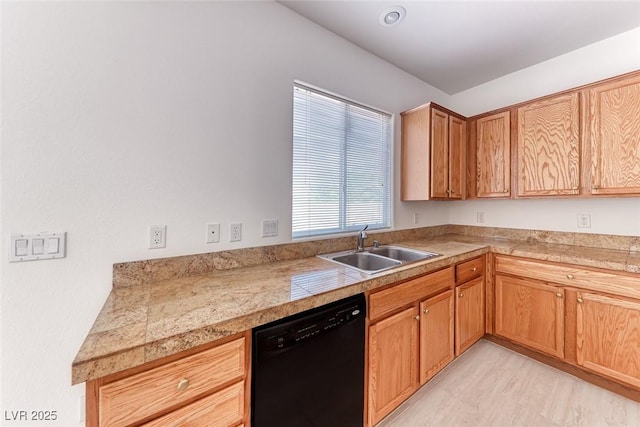 kitchen featuring black dishwasher, a sink, and tile countertops