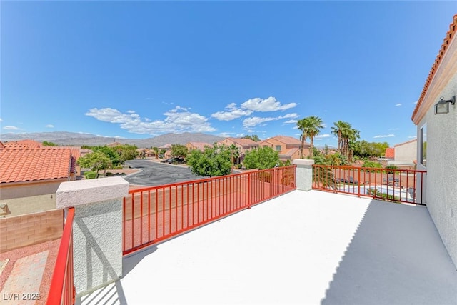 view of patio / terrace featuring a mountain view
