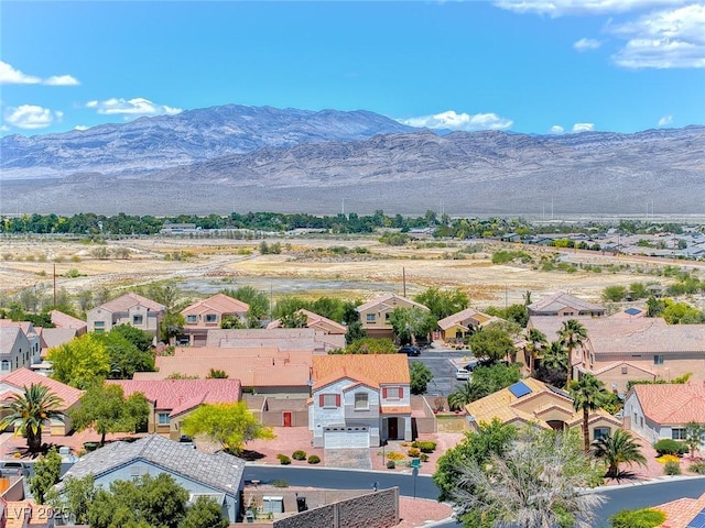 aerial view of residential area with a mountain backdrop