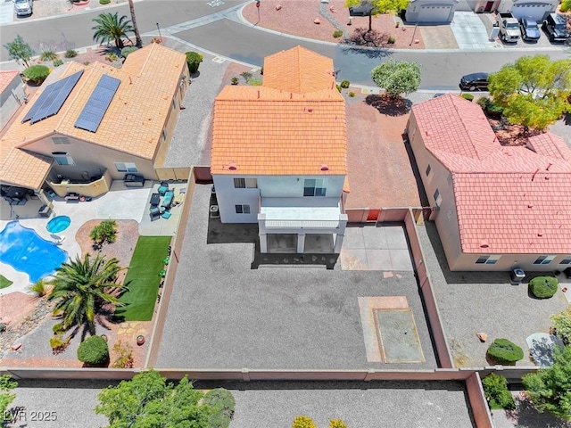 view of subject property with a pool
