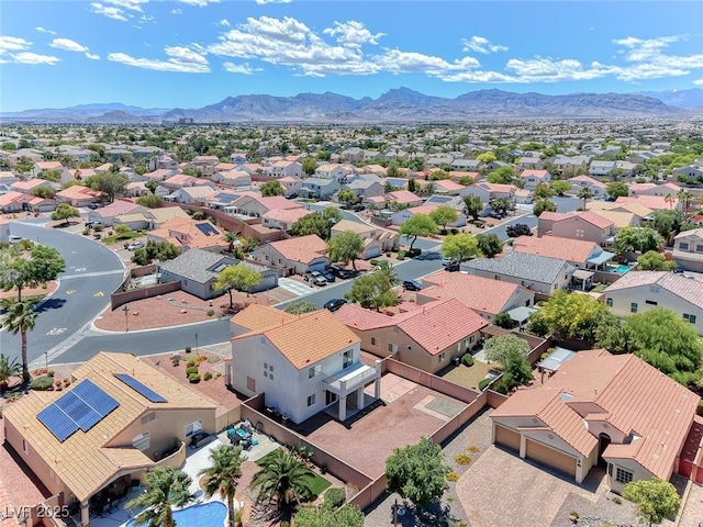 aerial view of residential area with mountains
