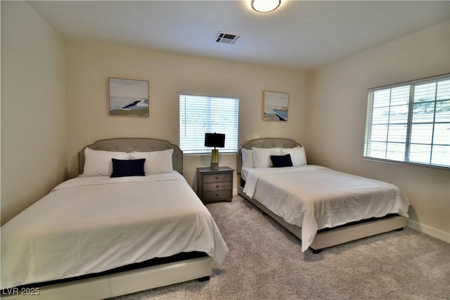 2926 E Eldorado Ln, Las Vegas, NV 89120 - bedroom featuring multiple windows, carpet flooring, and baseboards