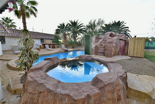 2926 E Eldorado Ln, Las Vegas, NV 89120 - view of pool featuring a pool with connected hot tub and fence