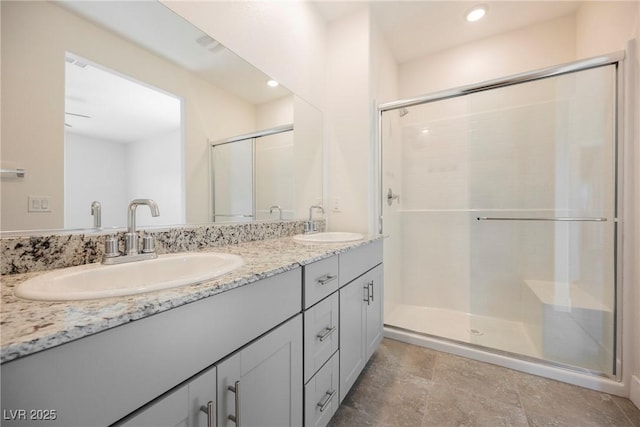 37 Late Harvest Ave, Pahrump, NV 89060 - bathroom featuring a shower stall, double vanity, and recessed lighting