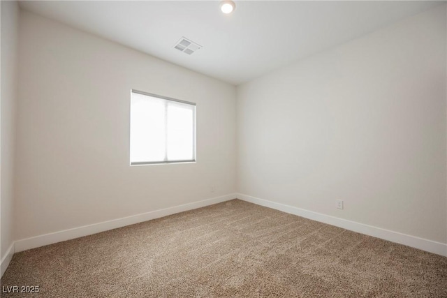 37 Late Harvest Ave, Pahrump, NV 89060 - empty room featuring light colored carpet, baseboards, and recessed lighting