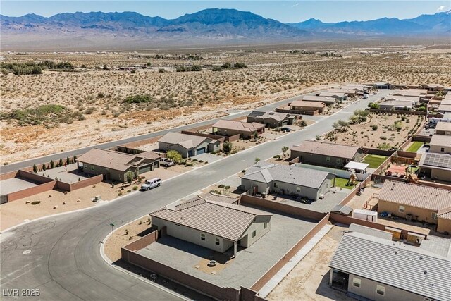 37 Late Harvest Ave, Pahrump, NV 89060 - aerial view of residential area featuring a mountainous background and a desert landscape