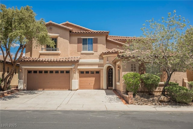 8244 Cupertino Heights Way, Las Vegas, NV 89178 - mediterranean / spanish-style home with an attached garage, stucco siding, a tiled roof, and concrete driveway