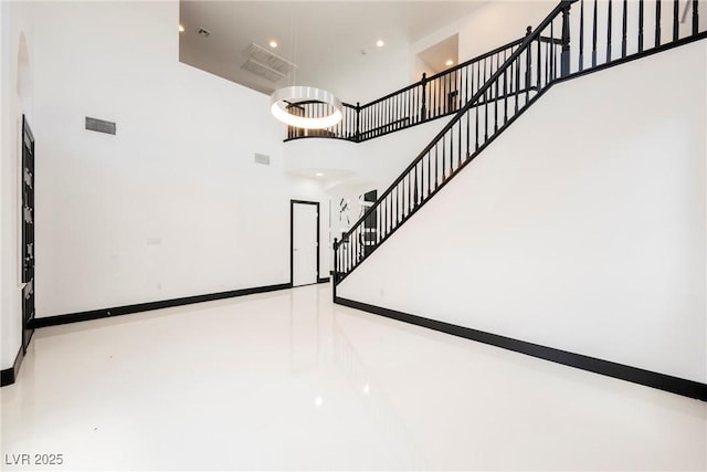 8244 Cupertino Heights Way, Las Vegas, NV 89178 - stairway with a towering ceiling, recessed lighting, and baseboards