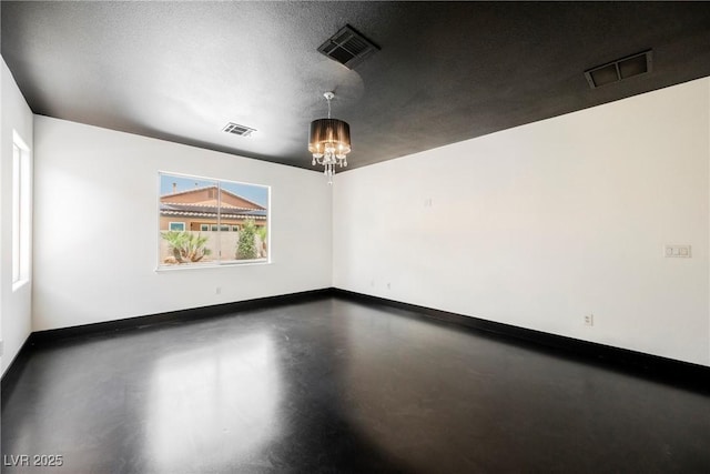 8244 Cupertino Heights Way, Las Vegas, NV 89178 - empty room featuring baseboards, concrete floors, and a chandelier