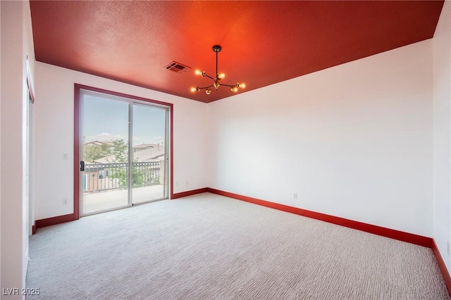 8244 Cupertino Heights Way, Las Vegas, NV 89178 - spare room featuring a chandelier, carpet floors, and baseboards