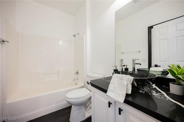 8244 Cupertino Heights Way, Las Vegas, NV 89178 - bathroom with toilet, vanity, shower / washtub combination, and wood finished floors