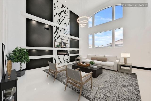 8244 Cupertino Heights Way, Las Vegas, NV 89178 - living area featuring a high ceiling and a chandelier