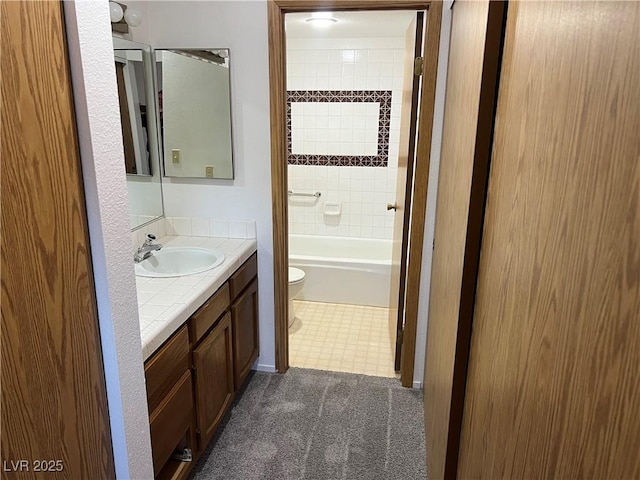 4121 Gannet Cir Unit 414, Las Vegas, NV 89103 - bathroom with toilet, vanity, tile patterned floors, and shower / bathtub combination