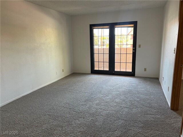 4121 Gannet Cir Unit 414, Las Vegas, NV 89103 - empty room with carpet and baseboards