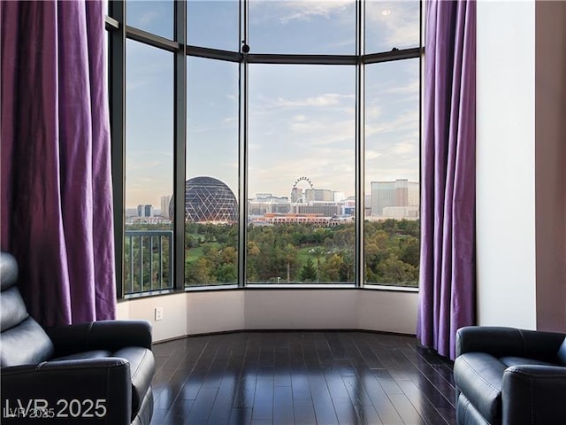 360 E Desert Inn Rd Unit 807, Las Vegas, NV 89109 - living area featuring a city view and dark wood-style floors