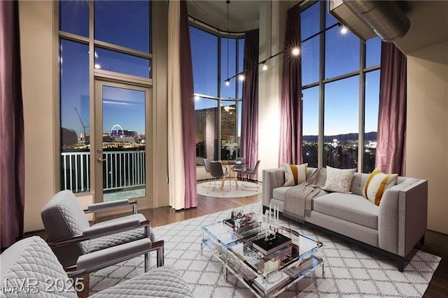 360 E Desert Inn Rd Unit 807, Las Vegas, NV 89109 - living room with a towering ceiling and wood finished floors