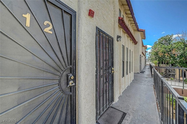 exterior space featuring stucco siding