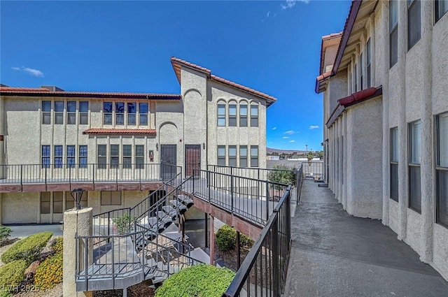view of property featuring stairway