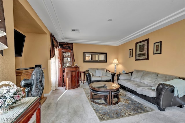 living room with carpet and baseboards