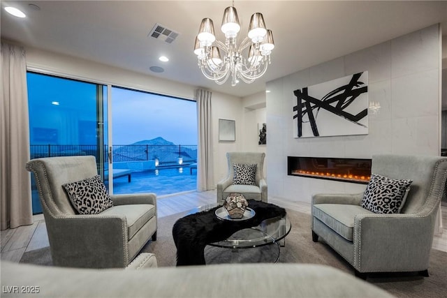 4576 Amazing View St, Las Vegas, NV 89129 - living area with a chandelier, recessed lighting, and a fireplace