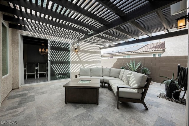 4576 Amazing View St, Las Vegas, NV 89129 - fenced backyard featuring an outdoor living space with a fire pit and a patio area
