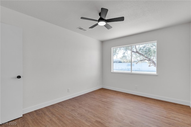 405 Oil Lantern Ln, Las Vegas, NV 89145 - empty room with wood finished floors, baseboards, and ceiling fan