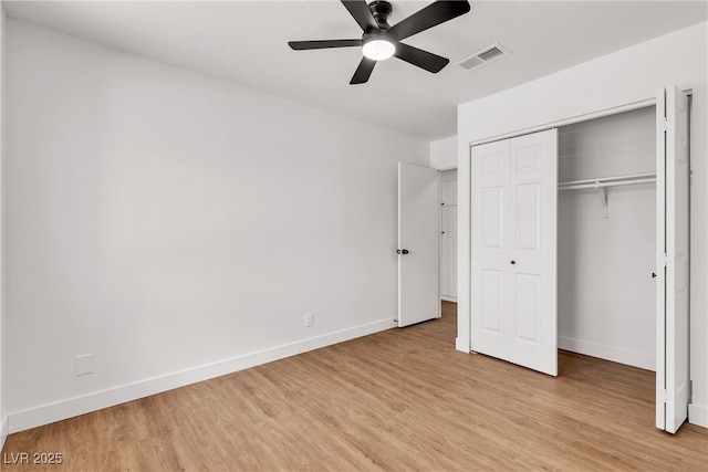405 Oil Lantern Ln, Las Vegas, NV 89145 - unfurnished bedroom featuring baseboards, light wood-type flooring, a closet, and a ceiling fan
