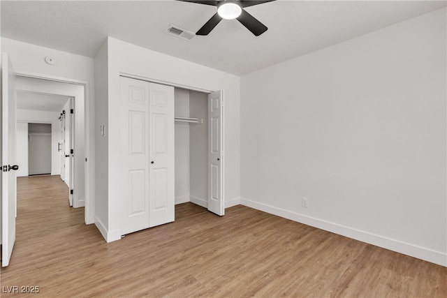 405 Oil Lantern Ln, Las Vegas, NV 89145 - unfurnished bedroom featuring light wood finished floors, baseboards, a closet, and ceiling fan