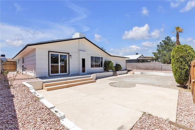 405 Oil Lantern Ln, Las Vegas, NV 89145 - back of house with a patio and a fenced backyard