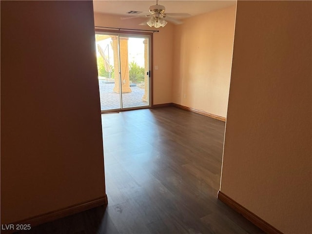 4455 W Ford Ave, Las Vegas, NV 89139 - spare room featuring dark wood-style flooring and a ceiling fan
