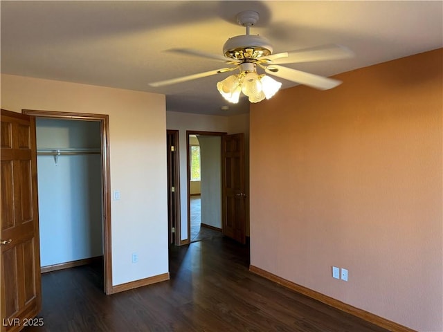4455 W Ford Ave, Las Vegas, NV 89139 - unfurnished bedroom with dark wood-style flooring, a closet, and ceiling fan