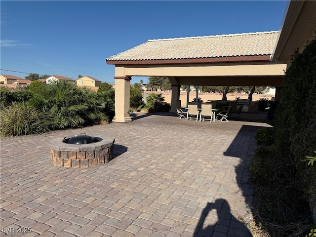 4455 W Ford Ave, Las Vegas, NV 89139 - view of patio / terrace featuring a gazebo, an outdoor fire pit, and outdoor dining area