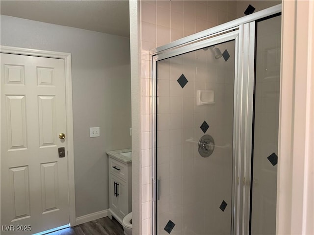 4455 W Ford Ave, Las Vegas, NV 89139 - full bath with a stall shower, vanity, and wood finished floors