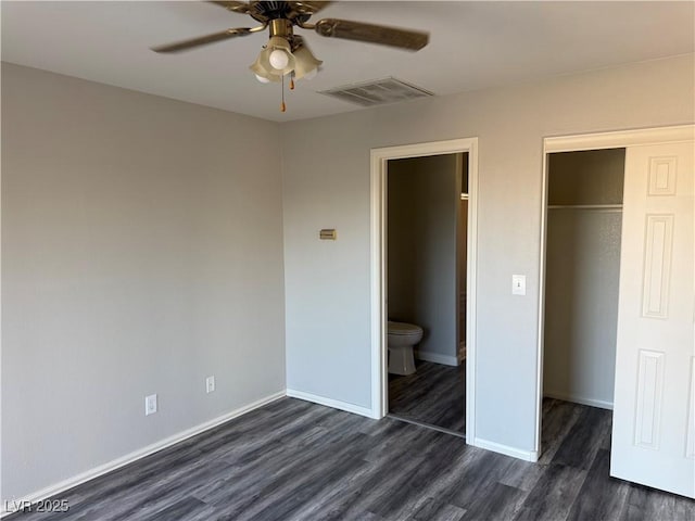 4455 W Ford Ave, Las Vegas, NV 89139 - unfurnished bedroom with dark wood-style floors, a closet, and a ceiling fan