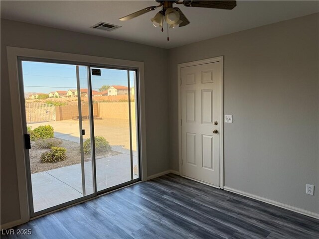 4455 W Ford Ave, Las Vegas, NV 89139 - empty room featuring dark wood finished floors and ceiling fan