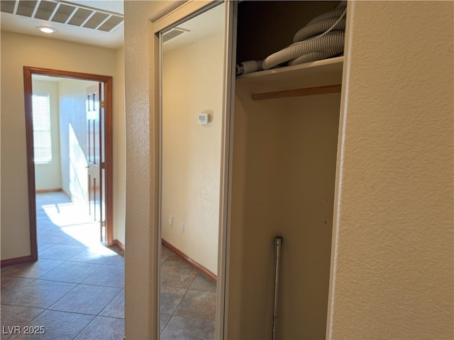 4455 W Ford Ave, Las Vegas, NV 89139 - hall with a textured wall and tile patterned flooring