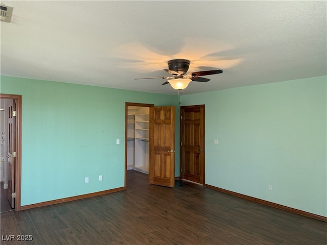 4455 W Ford Ave, Las Vegas, NV 89139 - unfurnished room with ceiling fan and dark wood finished floors